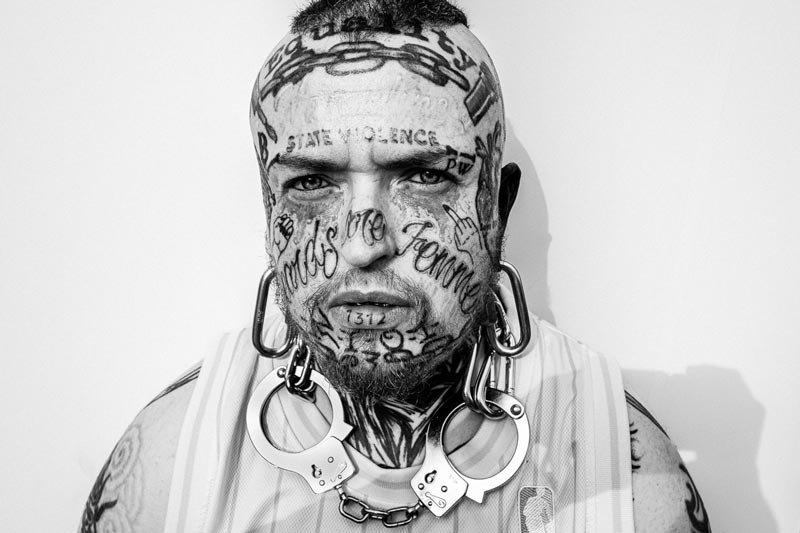 street portrait man with tattoo